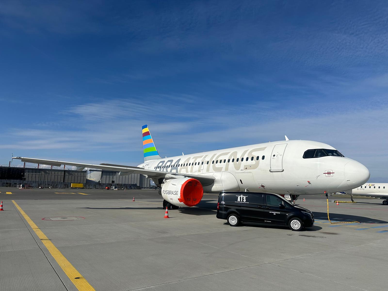 Braathens A320 at the gate with ATS line maintenance van